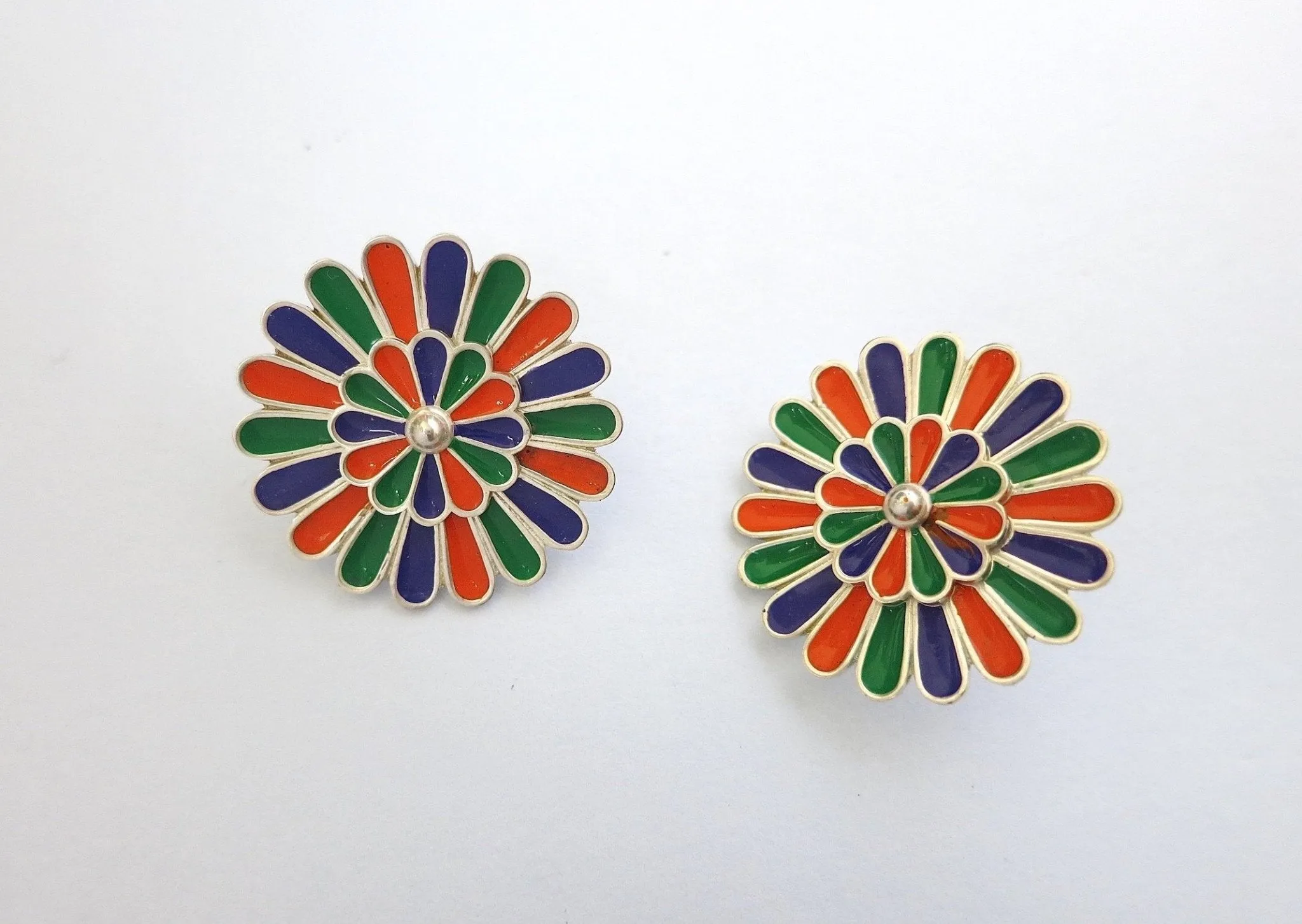 Artistic, modular earrings with removal enamel floral studs in center